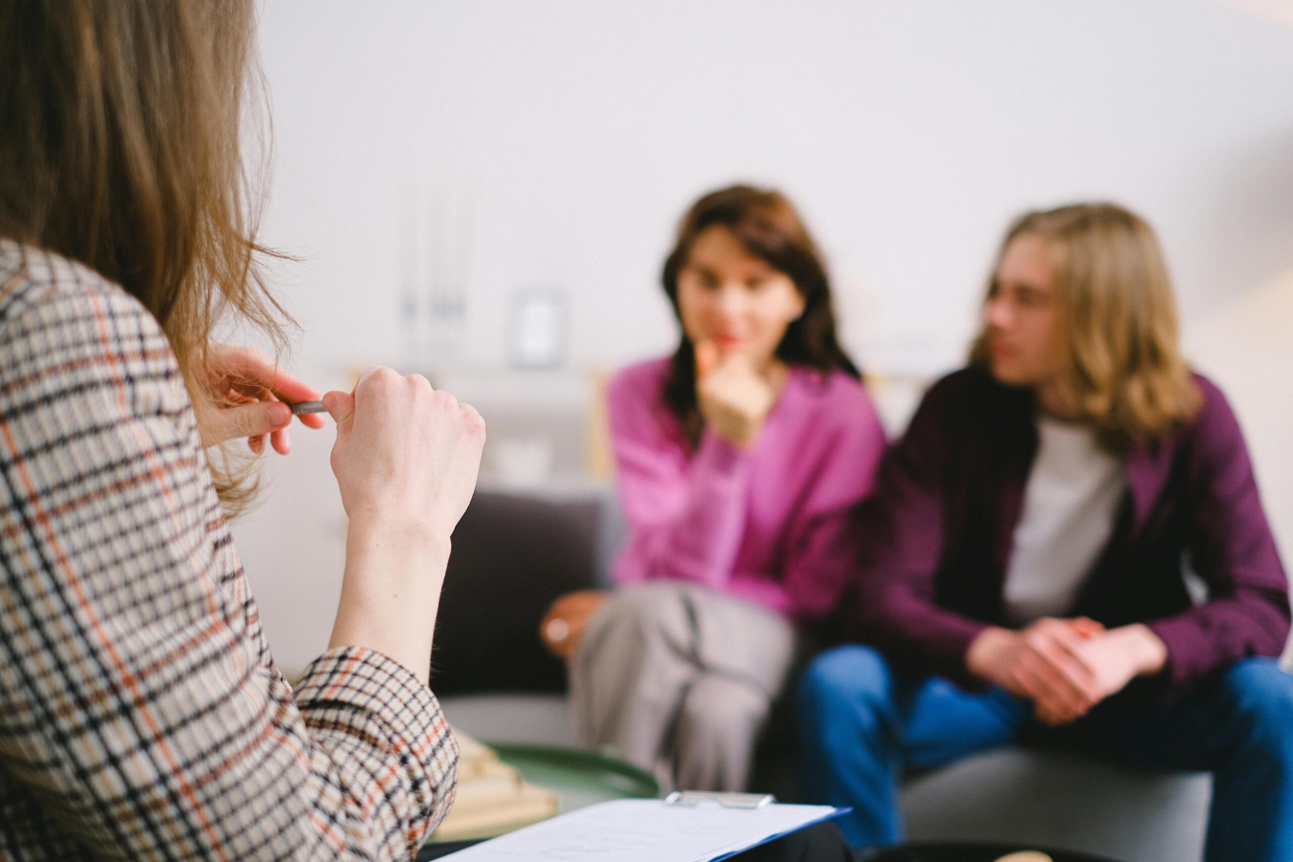 Therapist recognizing early signs of drug addiction in New Hampshire office